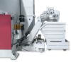 Chip conveyor with integrated coolant tank
